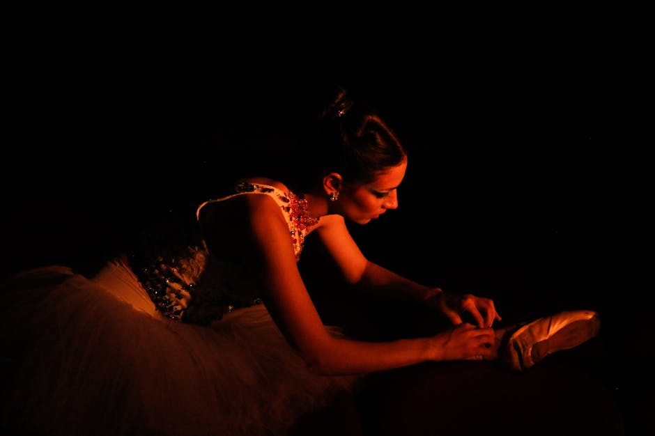 Dancer in velvet leotard on stage